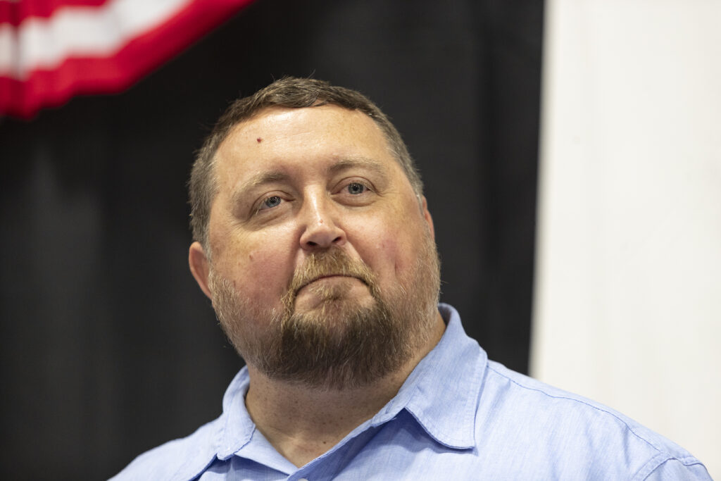 Al Chandler, a pastor and superintendent of the only private school in Graves County, gives the invocation at the Graves County Republican Breakfast, part of the Fancy Farm political festivities, Aug. 3, 2024. (Kentucky Lantern photo by Austin Anthony)